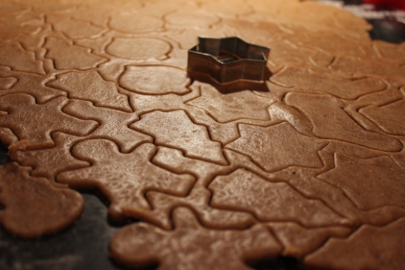 Cutting out gingerbread biscuits